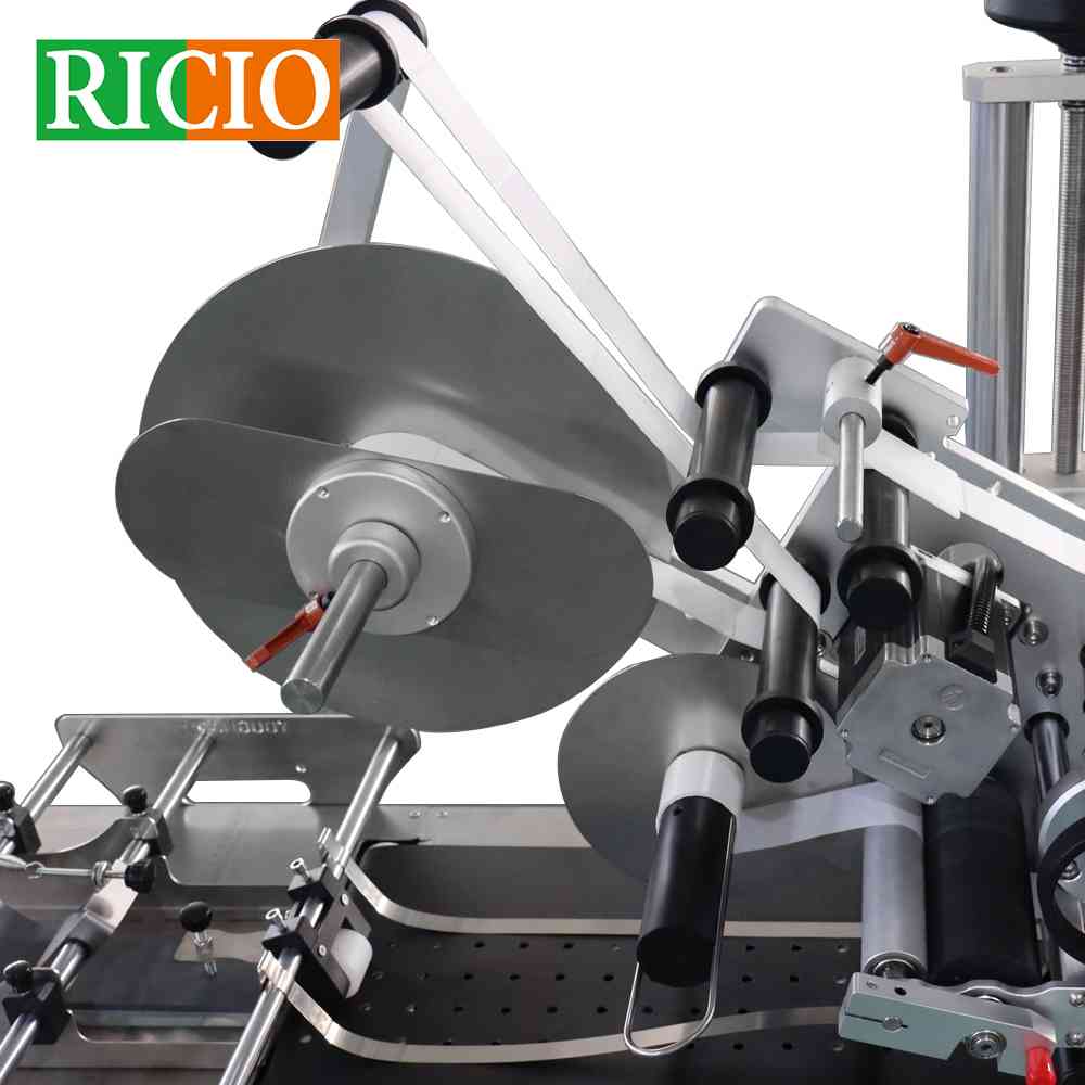 pouch label applicator